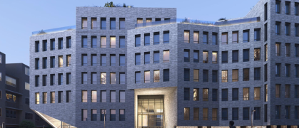 Rendering of grey apartment building in Williamsburg at dusk